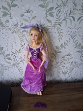 DISNEY STORE RAPUNZEL DOLL -