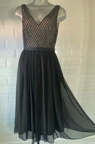 Size monsoon black - 10, beaded