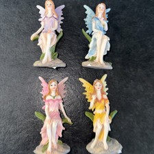 4  Flower Fairy Ornaments