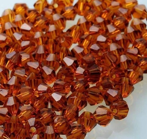 Glass 4mm faceted - 4mm, bicones