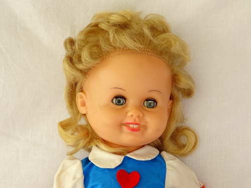 Antique baby doll with - , blue