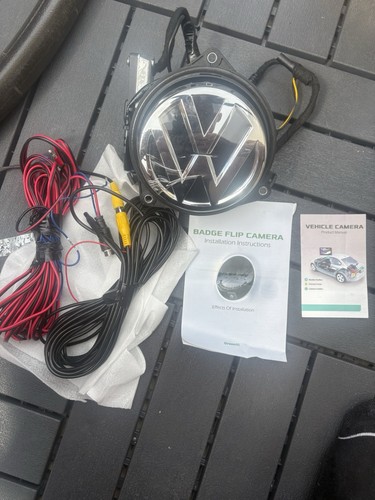 Volkswagen badge flip camera - volkswagen,