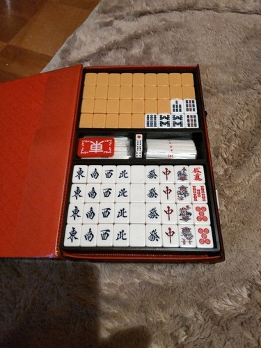 Orange mahjong set with - set,