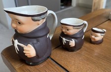 Goebel Set of three Graduated Friar Tuck pitchers