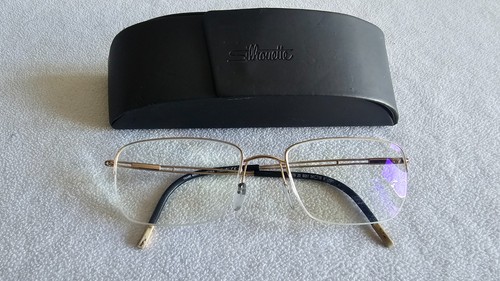 Silhouette gold glasses