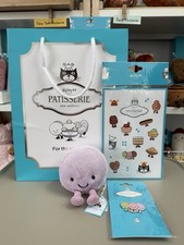 Jellycat Paris Exclusive May Macaron (Purple). BNWT, with pin and sticker