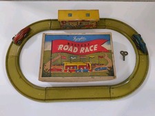 Vintage Fairylite Mystery Road Race tin toy car game.England.clockwork windup