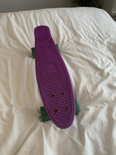 Purple penny board with blue - board,
