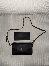 Authentic Coach black wyn cross body bag. Excellent Condition