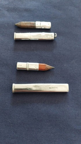 Two silver cased carpenters - silver,