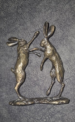 Solid bronze fighting - solid, hares