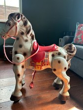 Retro metal Mobo ride on horse
