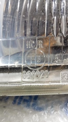 028020 headlamp left side
