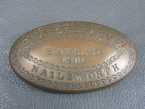 Antique brass miners snuff