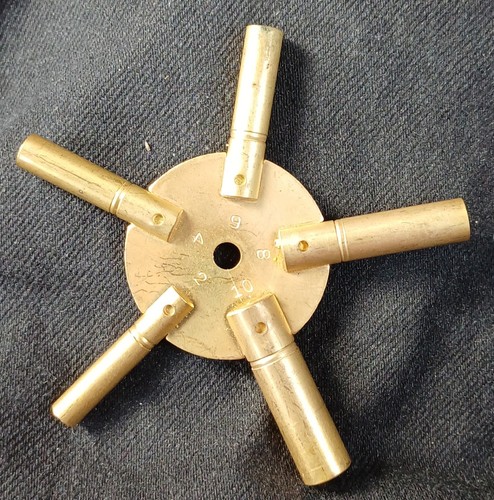 Clock main spring winding - clock, key