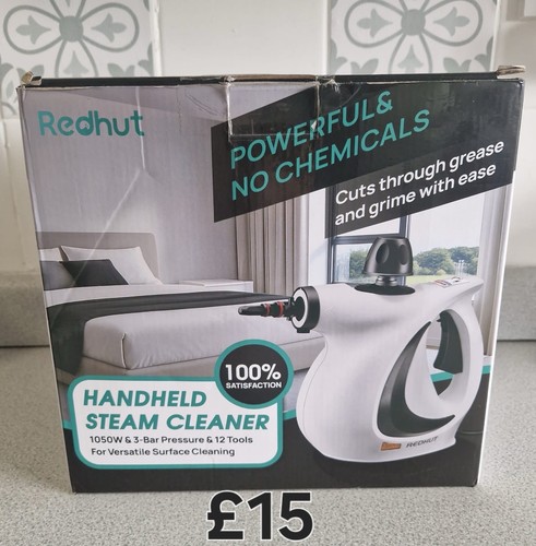 New boxed hand held steam - new,