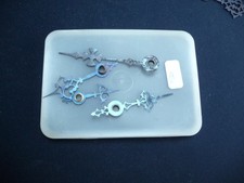 Lot of four Grandfather hour hands (A)