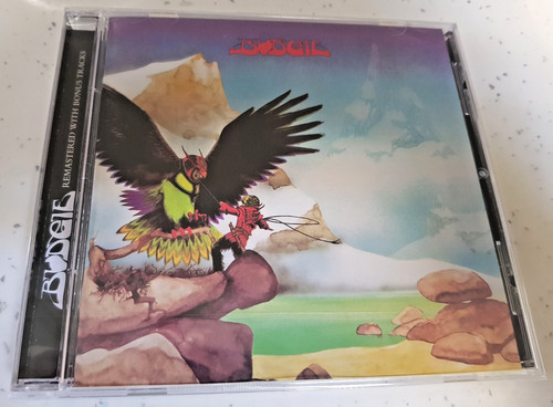 Budgie never turn your - , back