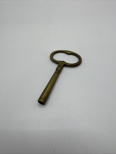 Antique brass clock winding - brass,