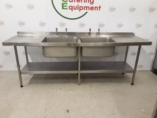 Used Catering Stainless Steel Double Sink With Twin Drainers 240x65cm. Del Avail