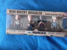 The Walming Dead Mini Wacky Wobbler Bobble-head Four Pack.