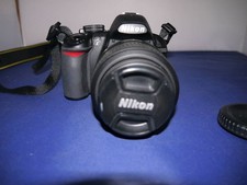 Nikon D3100 + Lens AF-S DX