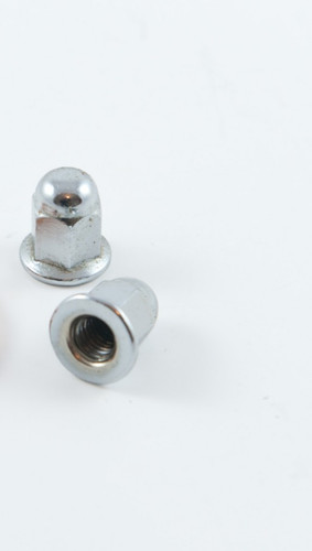 Motorcycle exhaust chrome nuts