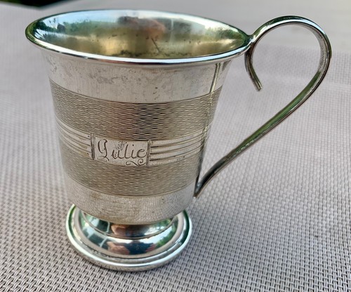Silver christening mug with