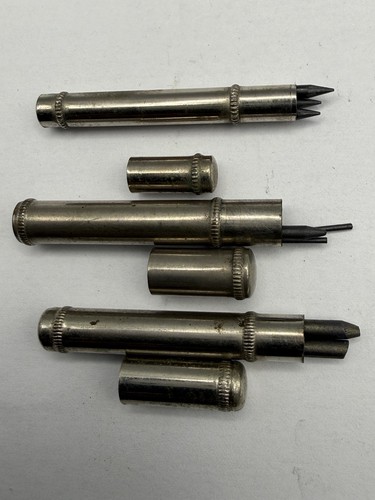 Three silver plate mechanical - three,