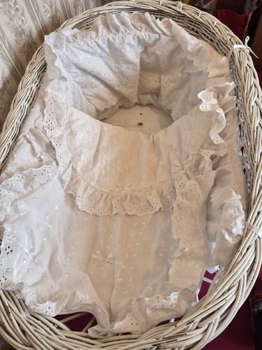 White wicker moses - basket, on