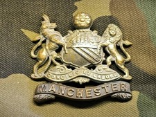 MANCHESTER INFANTRY REGIMENT WW1 CAP BADGE BRITISH ARMY WESTERN FRONT BATTLE