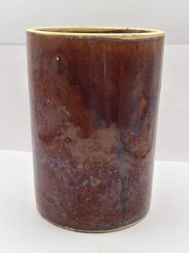 Old brown stoneware jar
