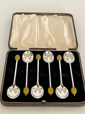 CASED SET OF 6 SILVER PLATED COFFEE BEAN SPOONS WITH YELLOW BEANS