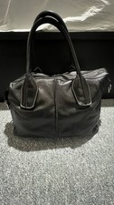 TOD’S  Black Leather Handbag. the bag doesn't have the strap.