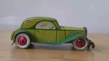 Vintage tin car clockwork