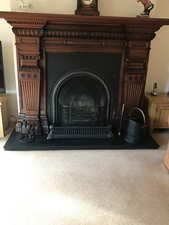 Mahogany Fire Surround With Cast Iron Insert.