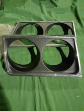 LANCIA BETA SEDAN 1ST SERIES PAIR OF HEADLIGHT FRAMES NEW