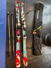 Head Twin tip and all mountain skis, Salomon Z2 bindings, poles & padded bag