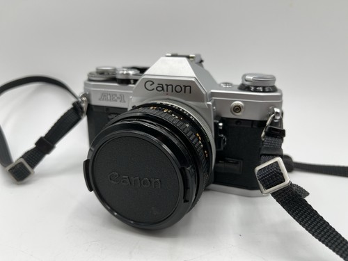 Nice working canon with - ae-1,