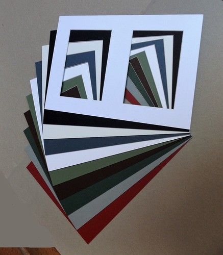 Cardboard mounts with - with, @