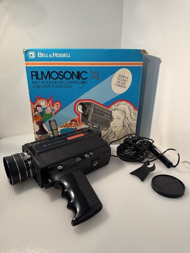 Boxed bell howell - &,