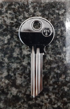 Yale metal head silver key