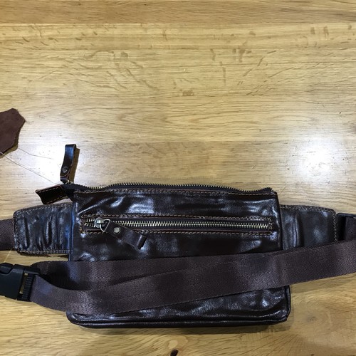 Brown leather bum - leather,