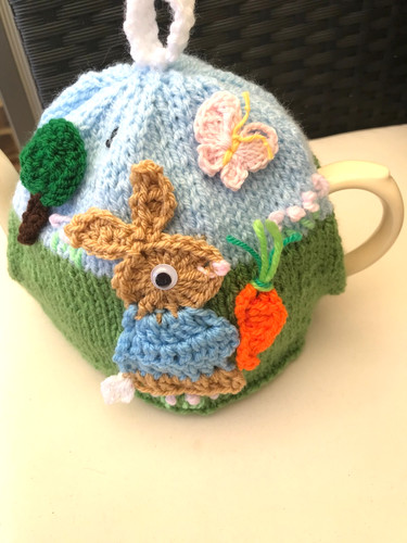 Hand knitted peter rabbit - hand,