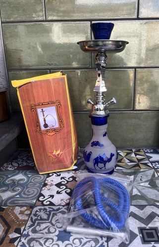 Reduced blue and clear glass - and,