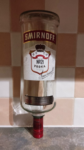 Empty smirnoff vodka bottle - empty,