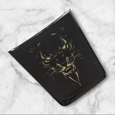 Steering wheel cover badge for