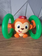 Bright Starts Roll Glow Monkey Baby Musical Toy with Lightup Wheel