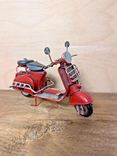 Vintage red metal scooter - metal,