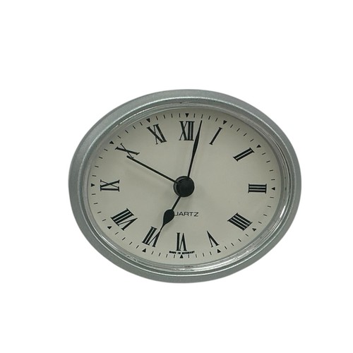 Silver oval quartz clock - quartz,